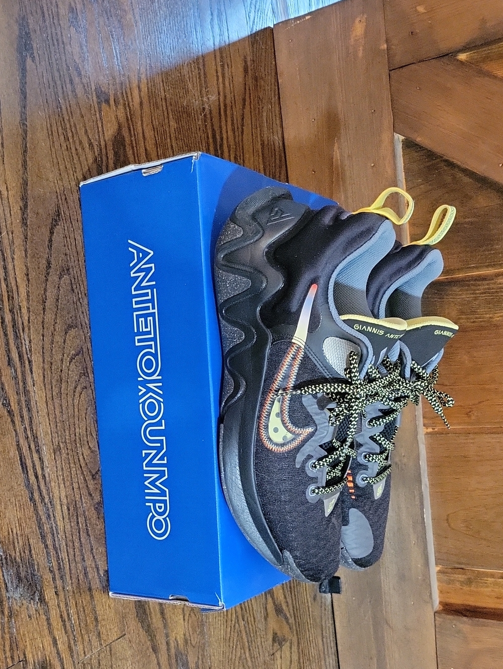 Giannis Immortality Low. Black & Gray Basketball Sneakers with Yellow Accents